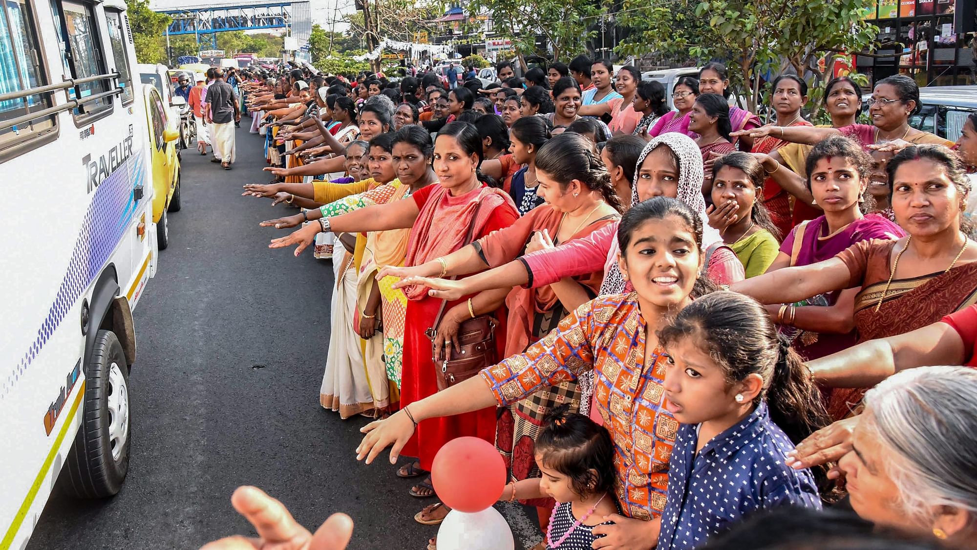 Thousands of women take pledge while participating in the ‘Women’s Wall’ against communalism and gender discrimination in Kochi on 1 January.&nbsp;