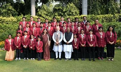 New Delhi: Prime Minister Narendra Modi with the recipients of Pradhan Mantri Rashtriya Bal Puraskar 2019 in New Delhi, on Jan 24, 2019. Also seen Union Women and Child Development Minister Maneka Gandhi. (Photo: IANS/PIB)