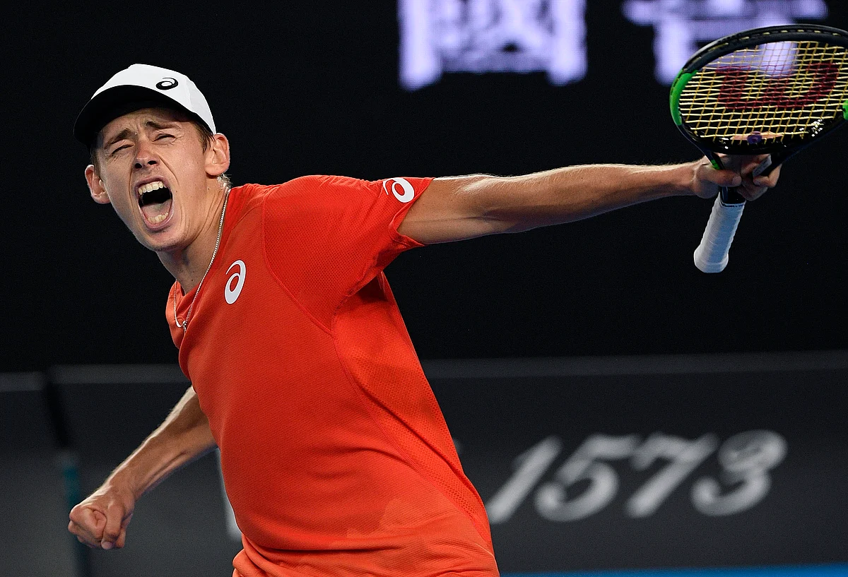 Australia’s Alex de Minaur celebrates after defeating Switzerland’s Henri Laaksonen in their second round match at the Australian Open tennis championships in Melbourne, Australia, Wednesday, Jan. 16, 2019.