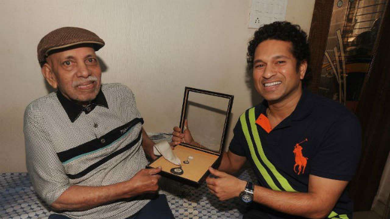 File photo of Sachin Tendulkar greeting his childhood coach Ramakant Achrekar.
