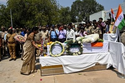 Tiruchirapalli: Defence Minister Nirmala Sitharaman lays wreath at the coffin of Sivchandran C, one of the 49 CRPF soldiers killed in 14 Feb Pulwama militant attacks at Tiruchirapalli in Tamil Nadu on Feb 16, 2019. (Photo: IANS)