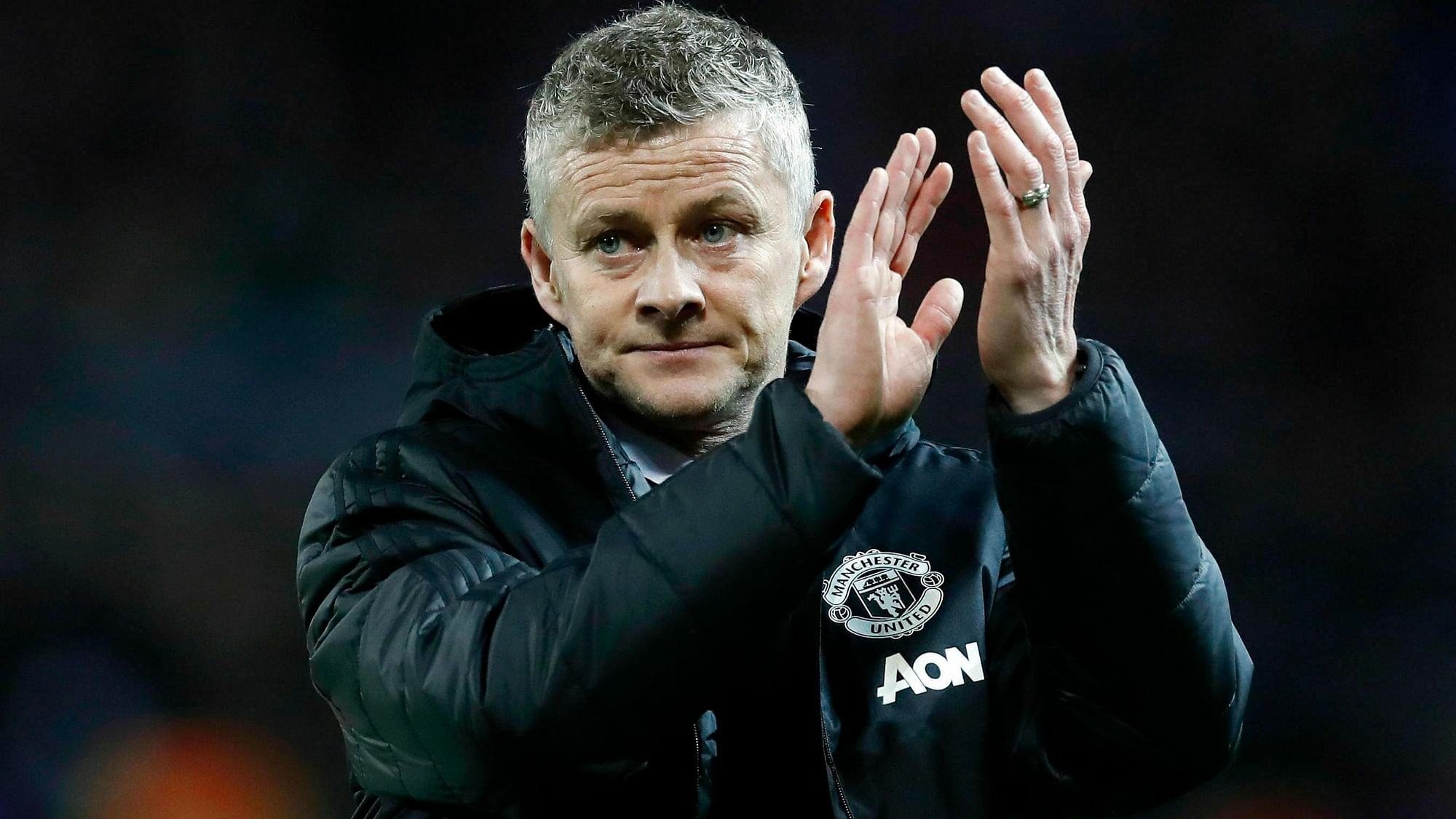 Manchester United caretaker manager Ole Gunnar Solskjaer leaves the field after defeat in the Champions League round of 16 match against Paris Saint Germain at Old Trafford stadium in Manchester, England, Tuesday, Feb. 12, 2019.