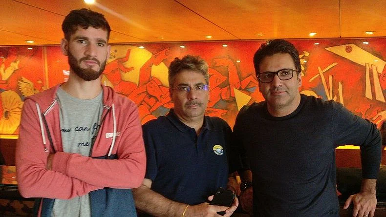 Real Kashmir forward Danish Farooq (left), along with the owners Sandeep Chattoo (centre) and Shamim Meraj.