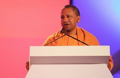 Varanasi: Uttar Pradesh Chief Minister Yogi Adityanath addresses at the first plenary session on "Engagement with younger members of Indian Diaspora" at Pravasi Bhartiya Divas 2019 in Varanasi, on Jan 21, 2019. (Photo: IANS/MEA)