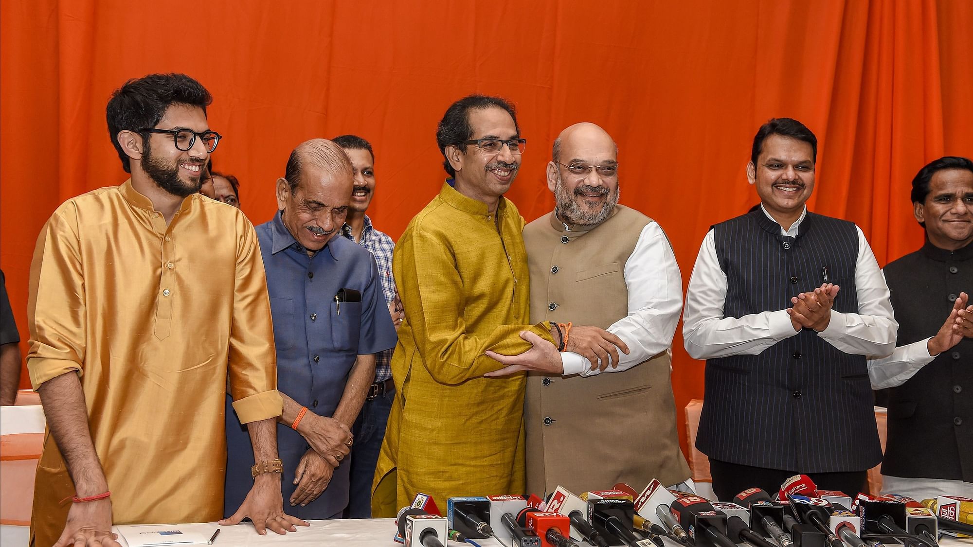 BJP President Amit Shah hugs Shiv Sena President Uddhav Thackeray after announcement of an alliance between Shiv Sena and BJP for Lok Sabha and Assembly polls, in Mumbai on Monday, 18 February, 2019.