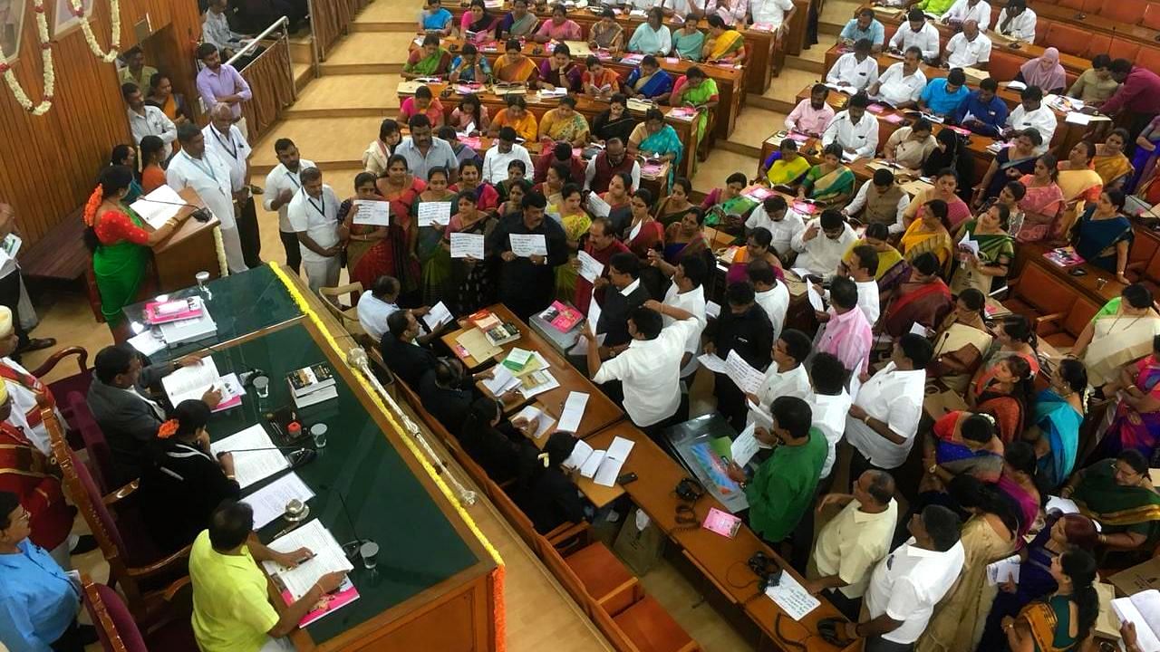 BJP corporators protest inside the council hall of BBMP even as Bengaluru mayor presents the 2019-20 budget for the city on Monday, 18 February.