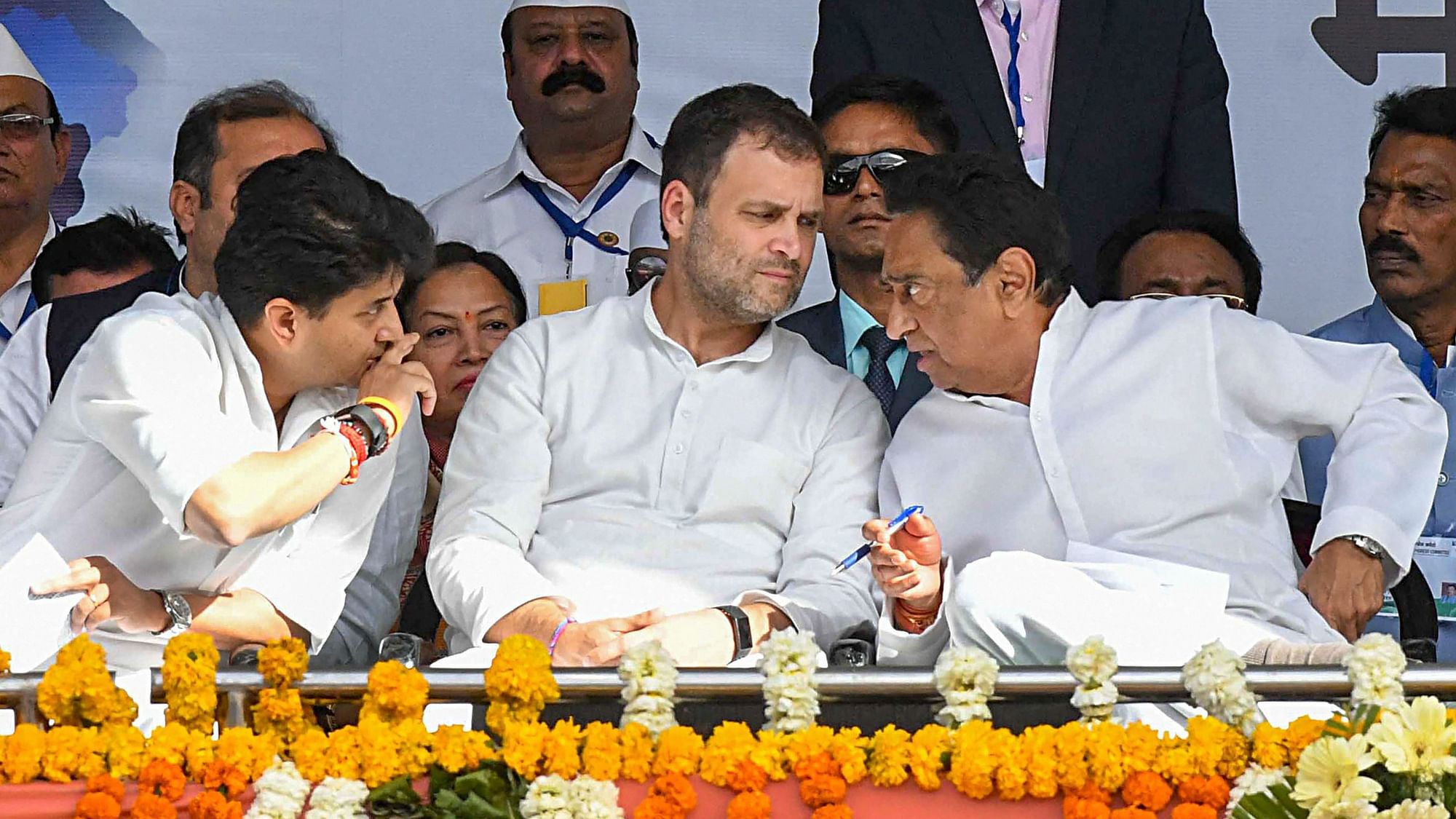 Congress President Rahul Gandhi, Madhya Pradesh CM Kamal Nath and AICC General Secretary Jyotiraditya Scindia during a public meeting in Bhopal.