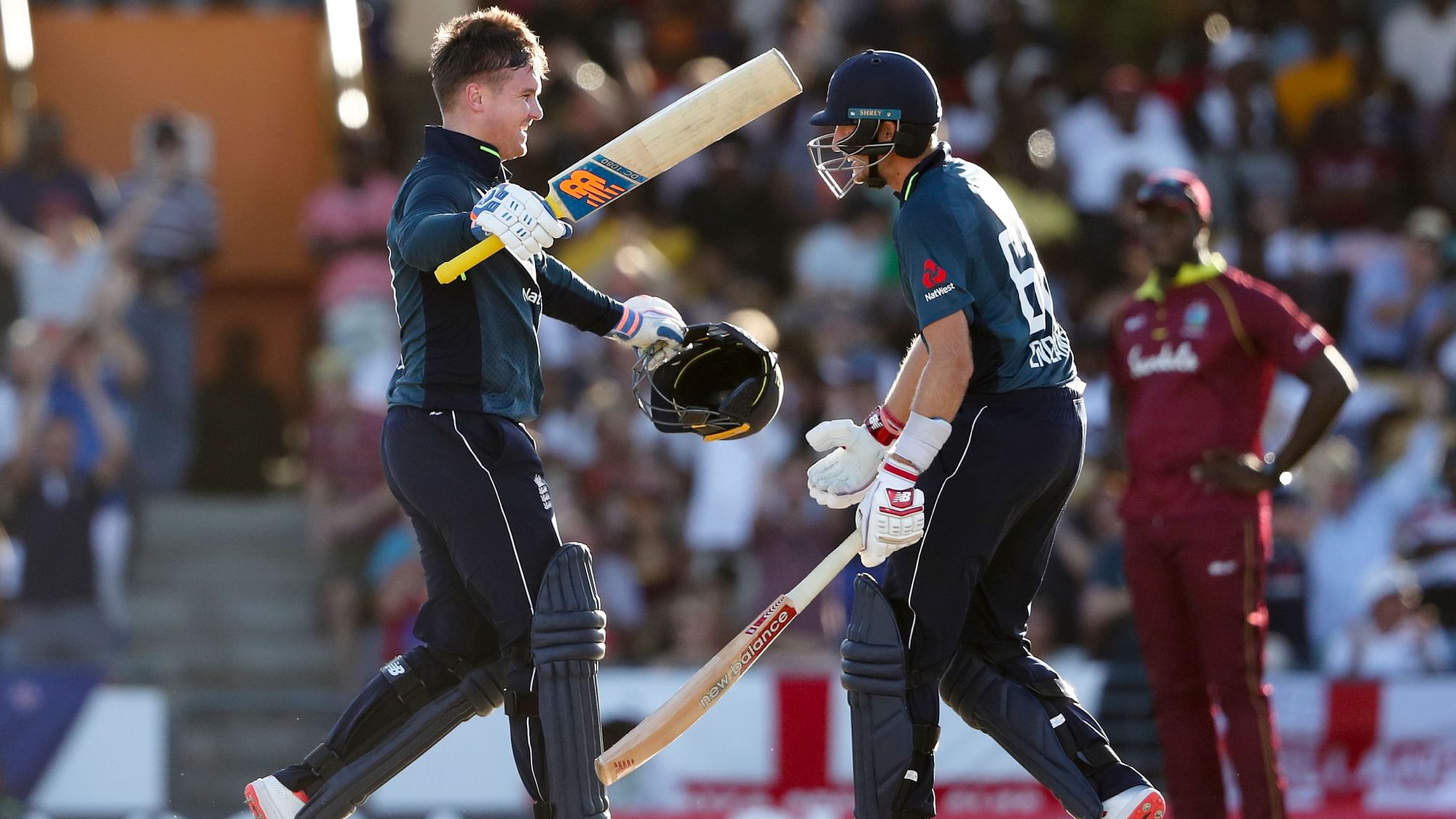 Jason Roy (left) and Joe Root hit centuries as England pulled off a record 361-run chase in their first ODI against West Indies at Barbados.