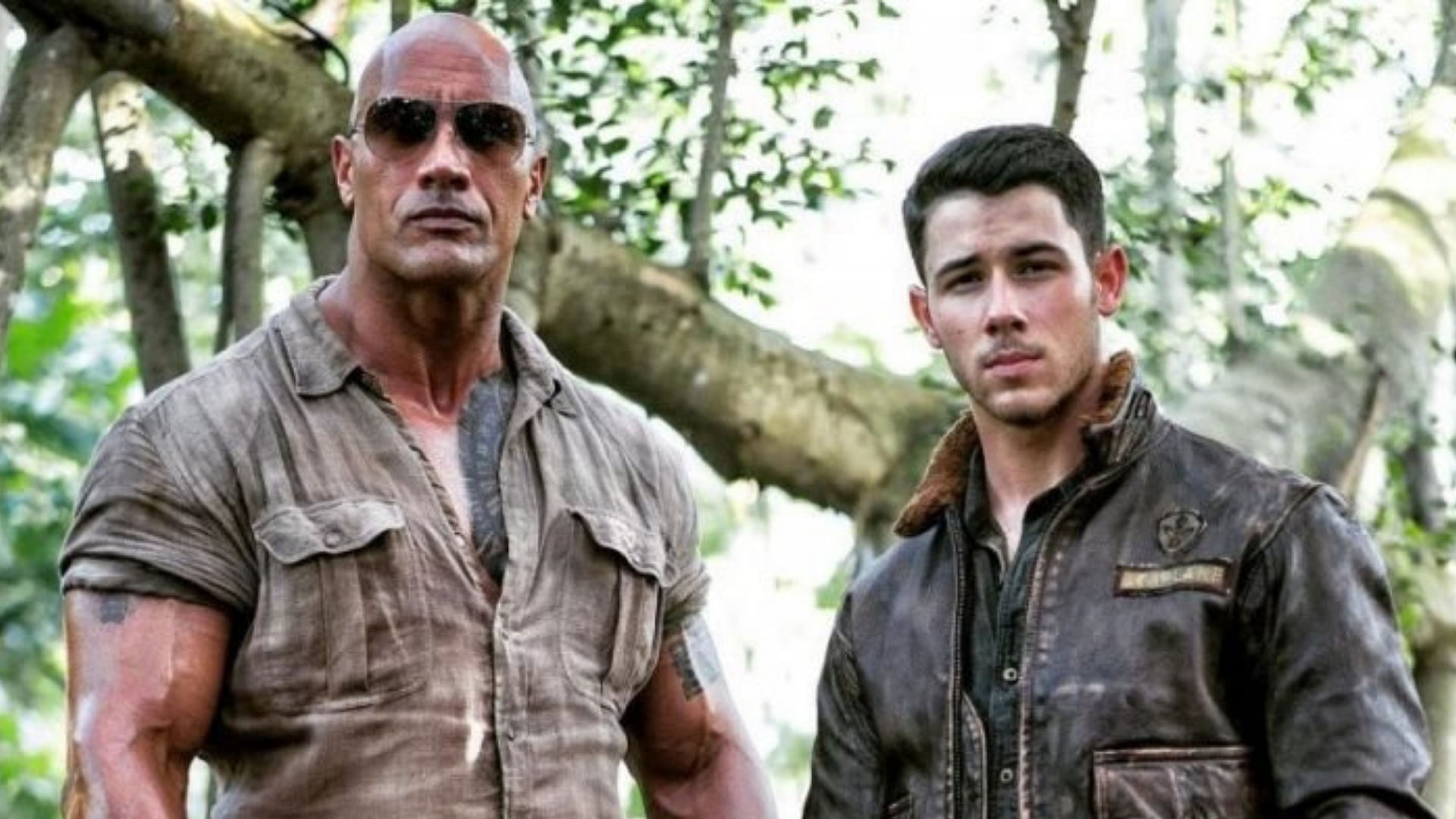 Dwayne Johnson and Nick Jonas in <i>Jumanji: Welcome to the Jungle</i>.