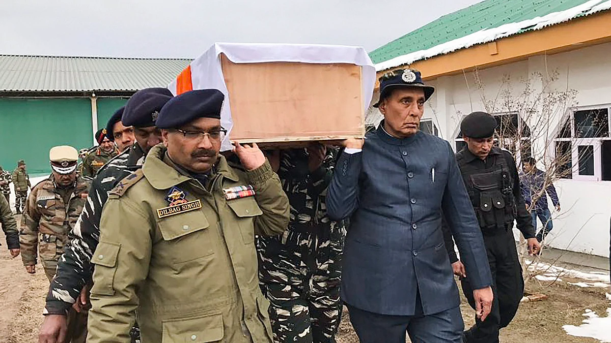Forty CRPF personnel were killed after a car carrying explosives hit a CRPF convoy in Jammu and Kashmir’s Pulwama. Home Minister Rajnath Singh carrying the mortal remains of one of the CRPF jawans.