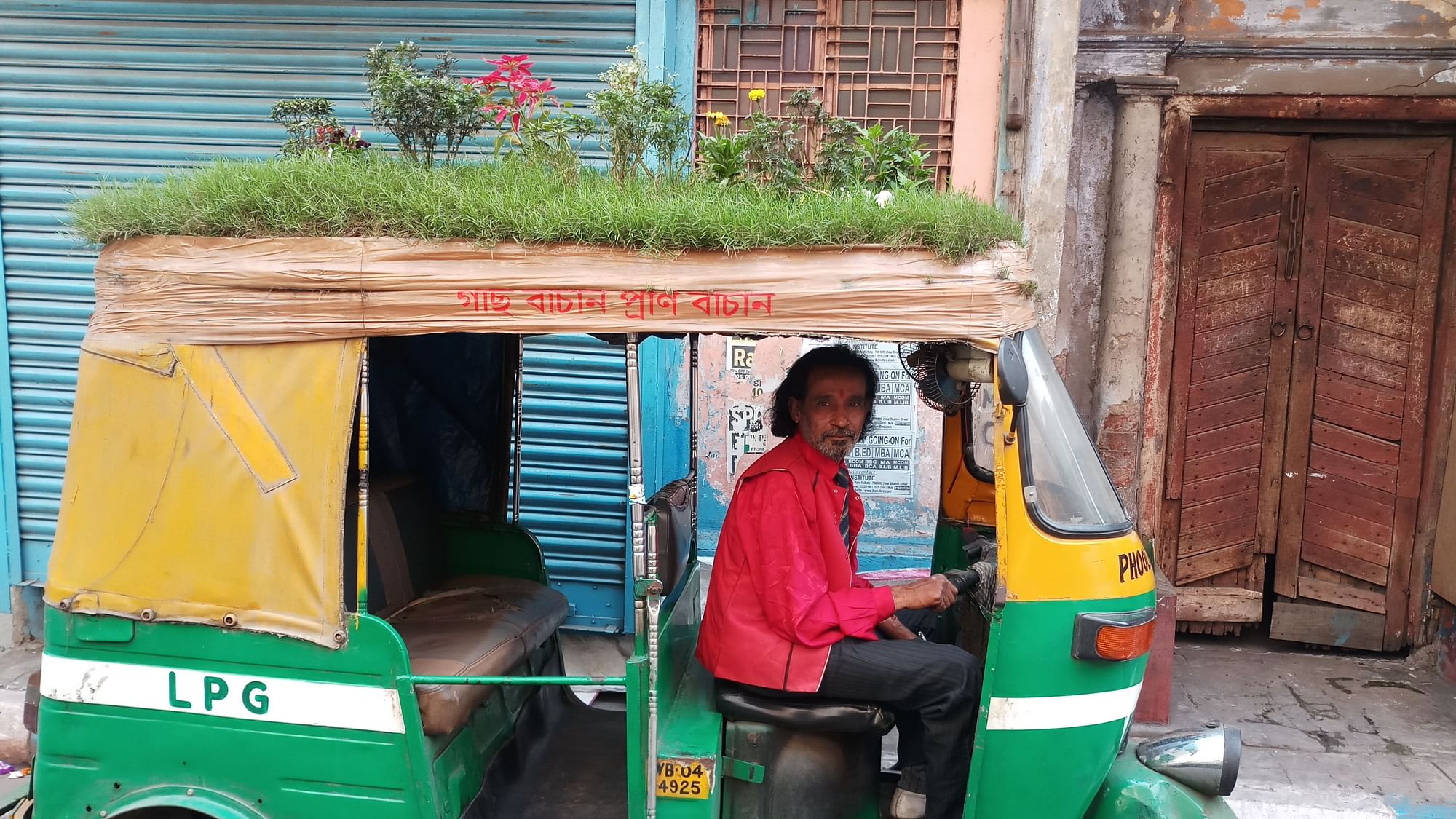 An Auto Rickshaw With a Rooftop Garden.