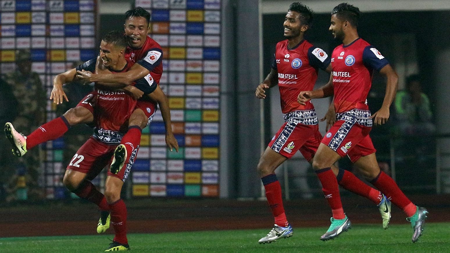 Jamshedpur FC players celebrate their win by 1-0 against Mumbai City FC on Friday.