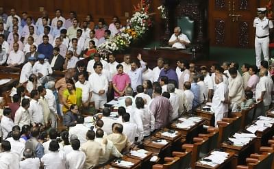 Bengaluru: BJP MLAs stage a protest in Karnataka Assembly during budget session in Bengaluru, on Feb 13, 2019. (Photo: IANS)