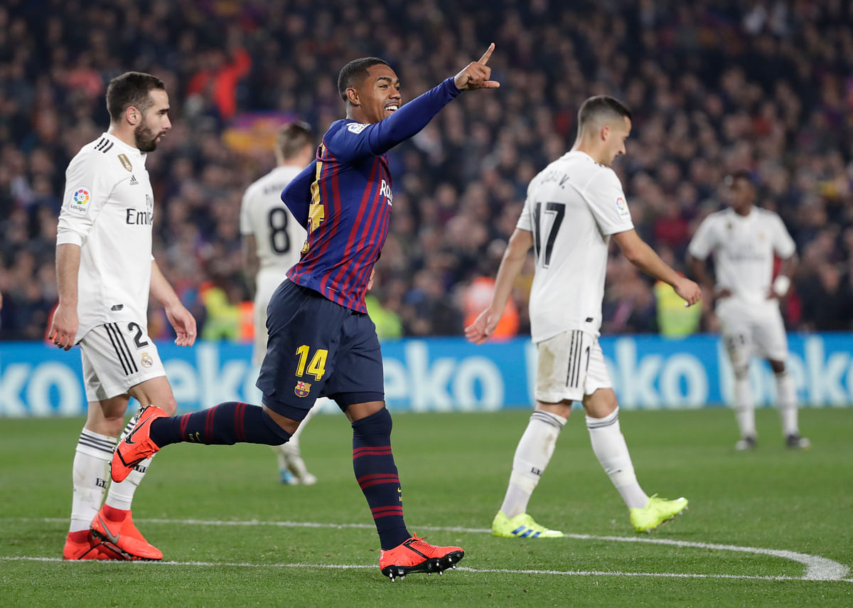 Real Madrid earned a 1-1 draw at Barcelona to take a slim away-goal advantage after the Copa del Rey semifinal.