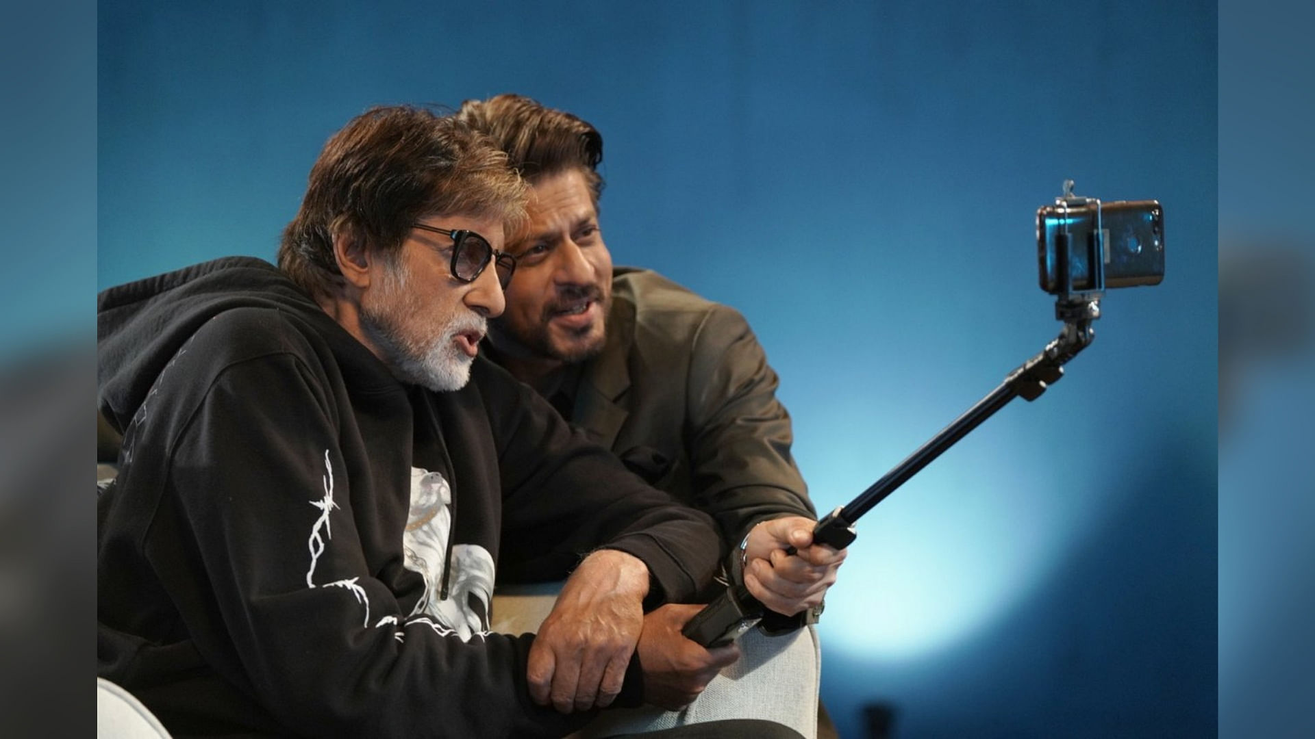 Amitabh Bachchan and Shah Rukh Khan attempt to record a selfie video.