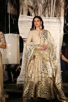 New Delhi: Actress Aditi Rao Hydari walks on the ramp for fashion designers Abu Jani and Sandeep Khosla