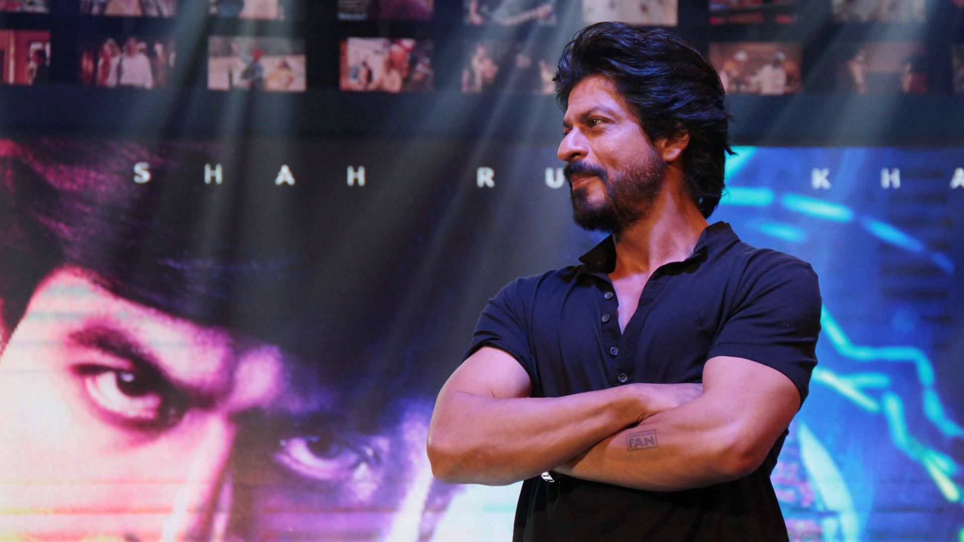 SRK promises to meet a disabled fan and his brother.