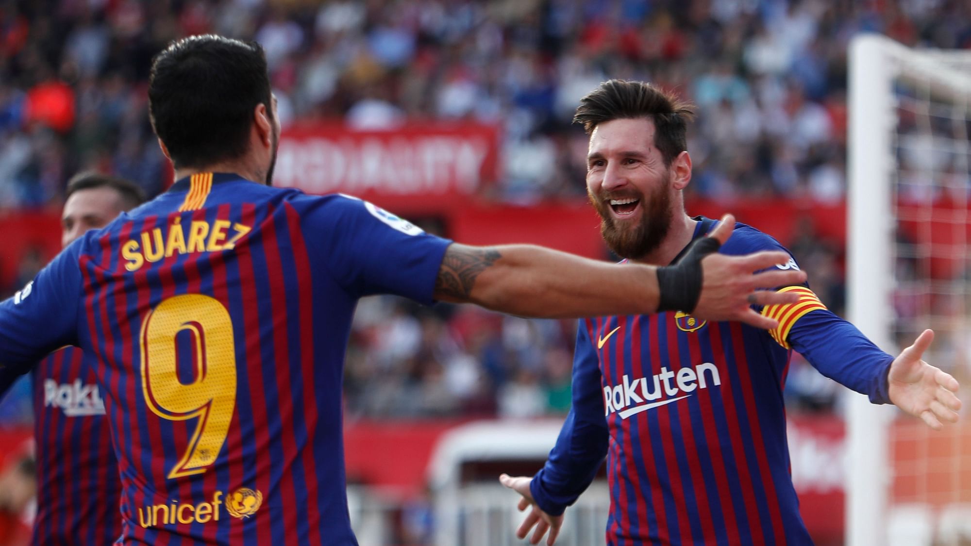 Lionel Messi scored a hat-trick and set up a final goal by Luis Suarez to earn Spanish league leader Barcelona a 4-2 comeback win at Sevilla.