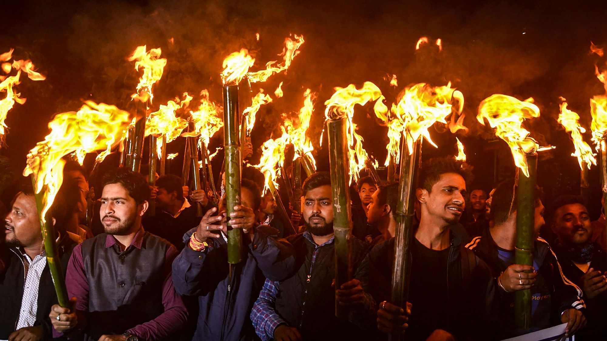 Activists of All Assam Students Union (AASU) and other organisations take part in a torch light rally procession to protest against the Citizenship (Amendment) Bill 2016, in Guwahati, Thursday, 31 January  2019.