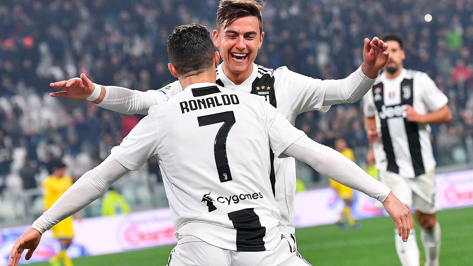 Juventus’ Cristiano Ronaldo celebrates with his teammate Paulo Dybala after scoring during the Serie A match against Frosinone at the Allianz Stadium in Turin, Italy on Friday.