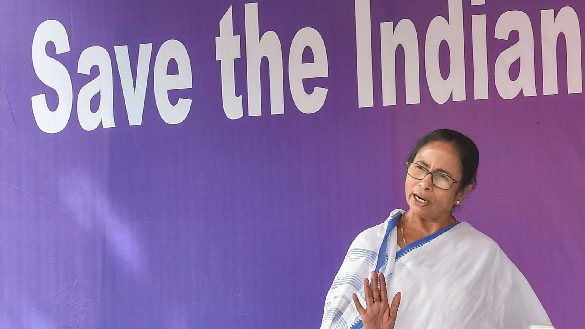 West Bengal CM Mamata Banerjee speaks to her party workers during the sit-in in Kolkata on Monday, 4 February.&nbsp;