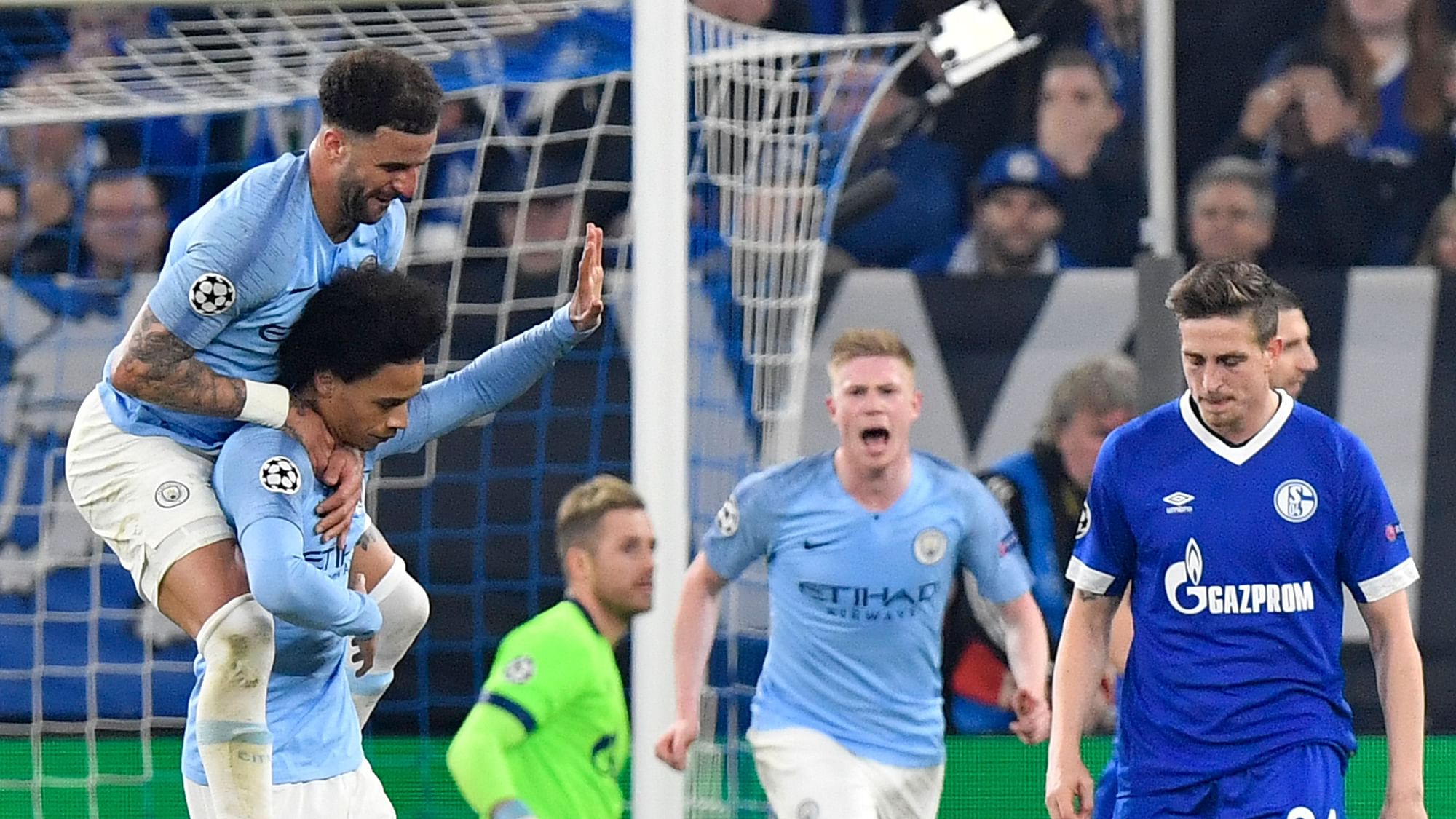 Leroy Sane (hand raised), a former Schalke player, reacts after scoring Manchester City’s equaliser in the UEFA Champions League round of 16 first leg clash at Gelsenkirchen.