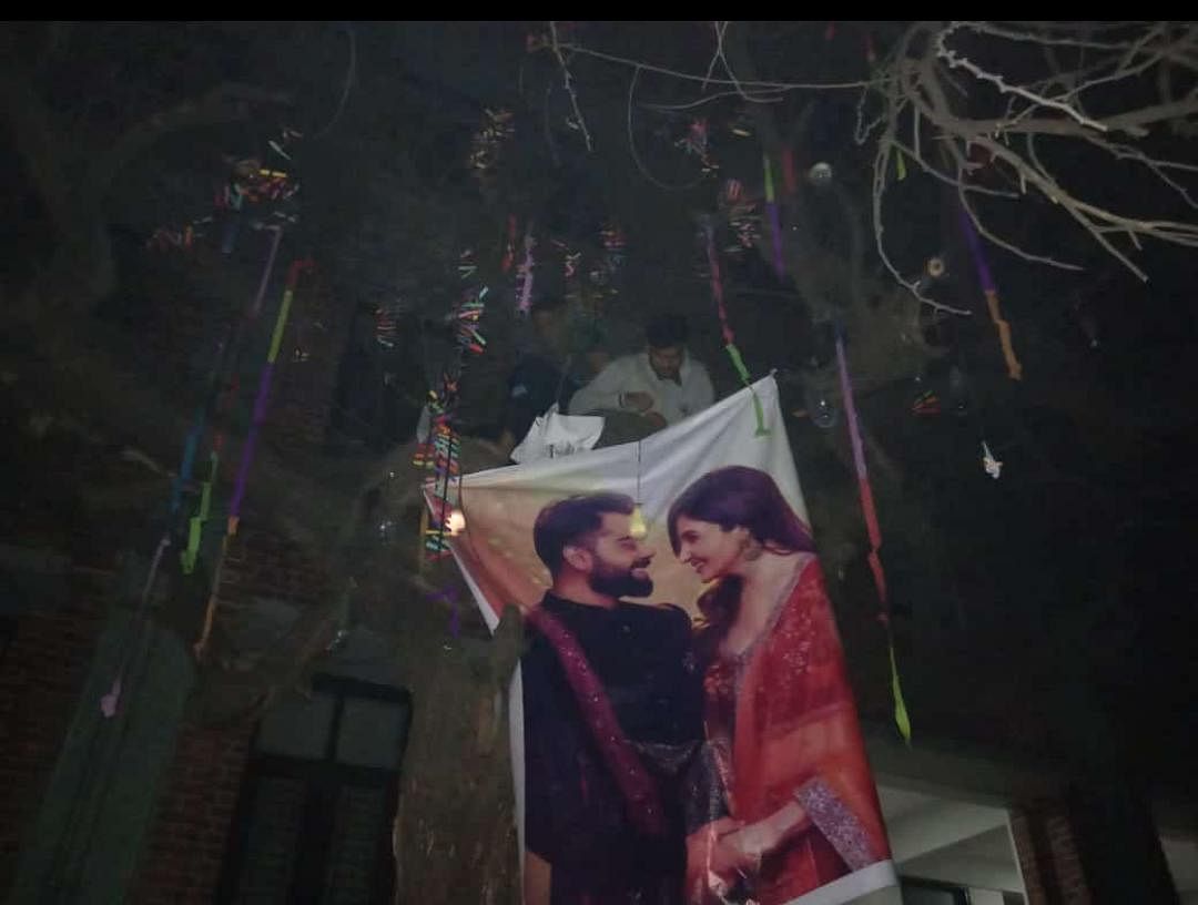 Instead of a famous actress, the college decided to hang a poster of couple Anushka Sharma and Virat Kohli. 