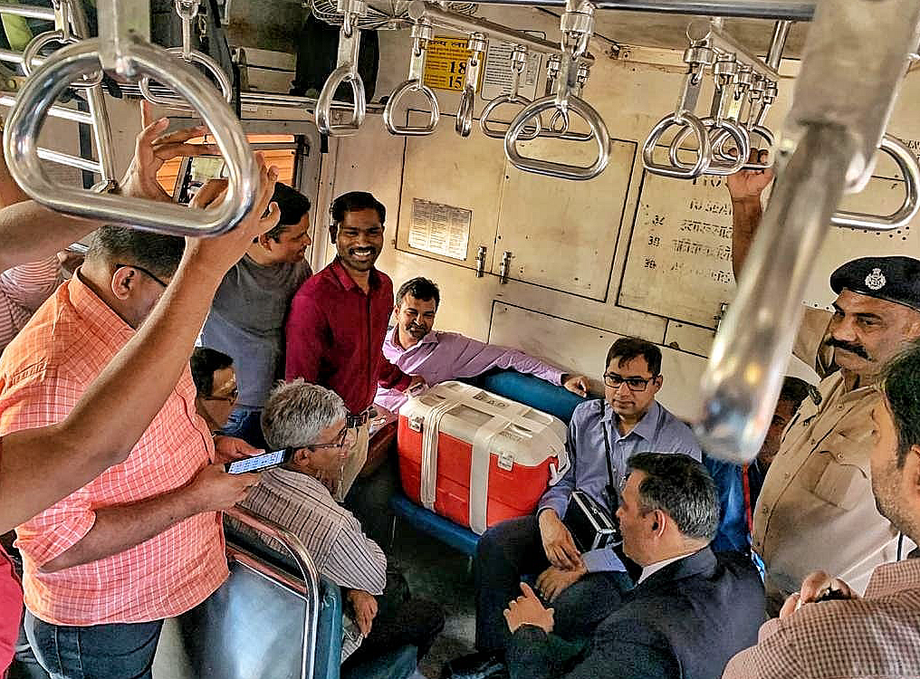 The transplant team on the train with the organ.