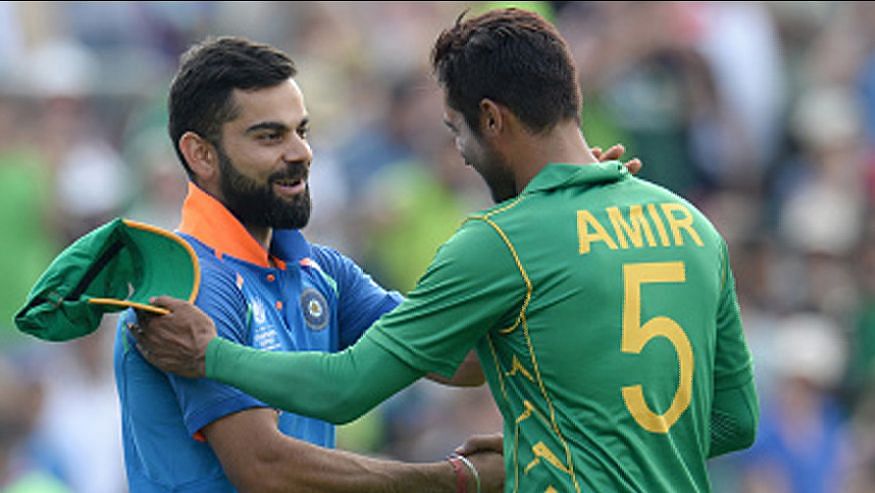 Virat Kohli and Mohammad Amir greet each other after the ICC Champions Trophy 2017 final, where Pakistan beat India by 180 runs.