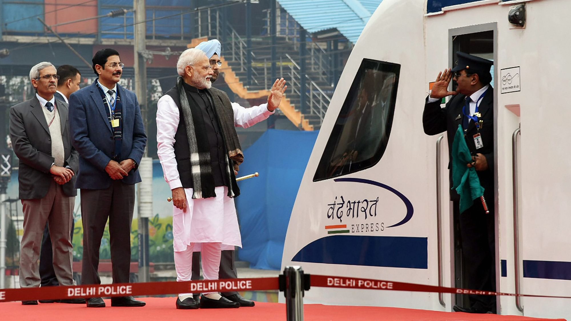 Prime Minister Narendra Modi flags off Vande Bharat Express, India’s first semi-high speed train, at New Delhi Railway Station.