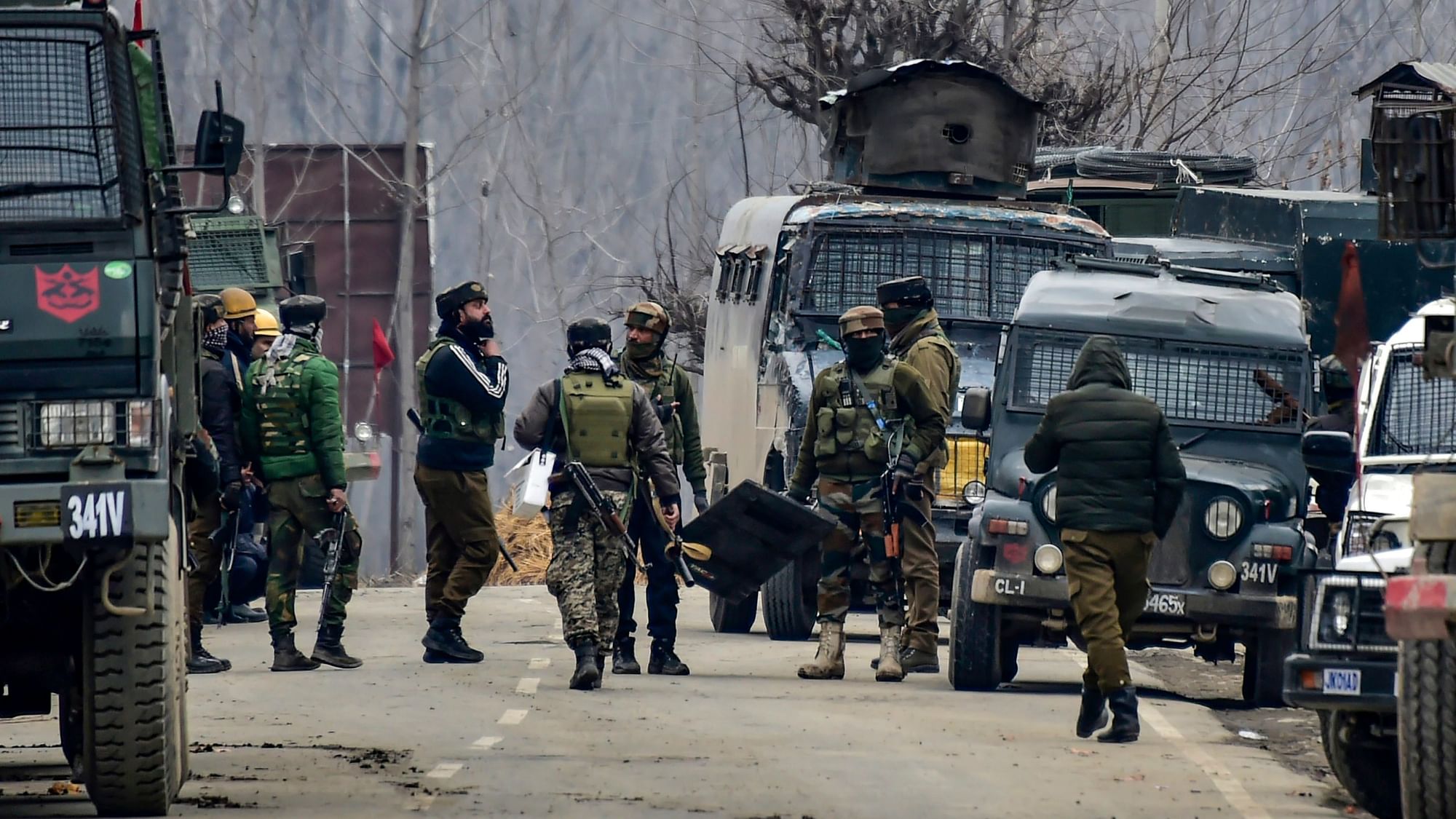 Security forces personnel arrive during a gunbattle with the militants in Pulwama in south Kashmir.