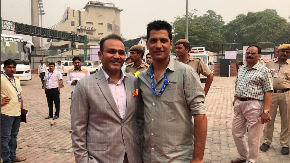 File picture of DDCA Selector Amit Bhandari with Virender Sehwag.