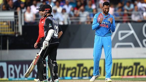 Krunal Pandya celebrates, even as Kane Williamson is dumbstruck, after Daryl Mitchell was adjudged out via DRS during the second NZ-India T20I at Auckland.