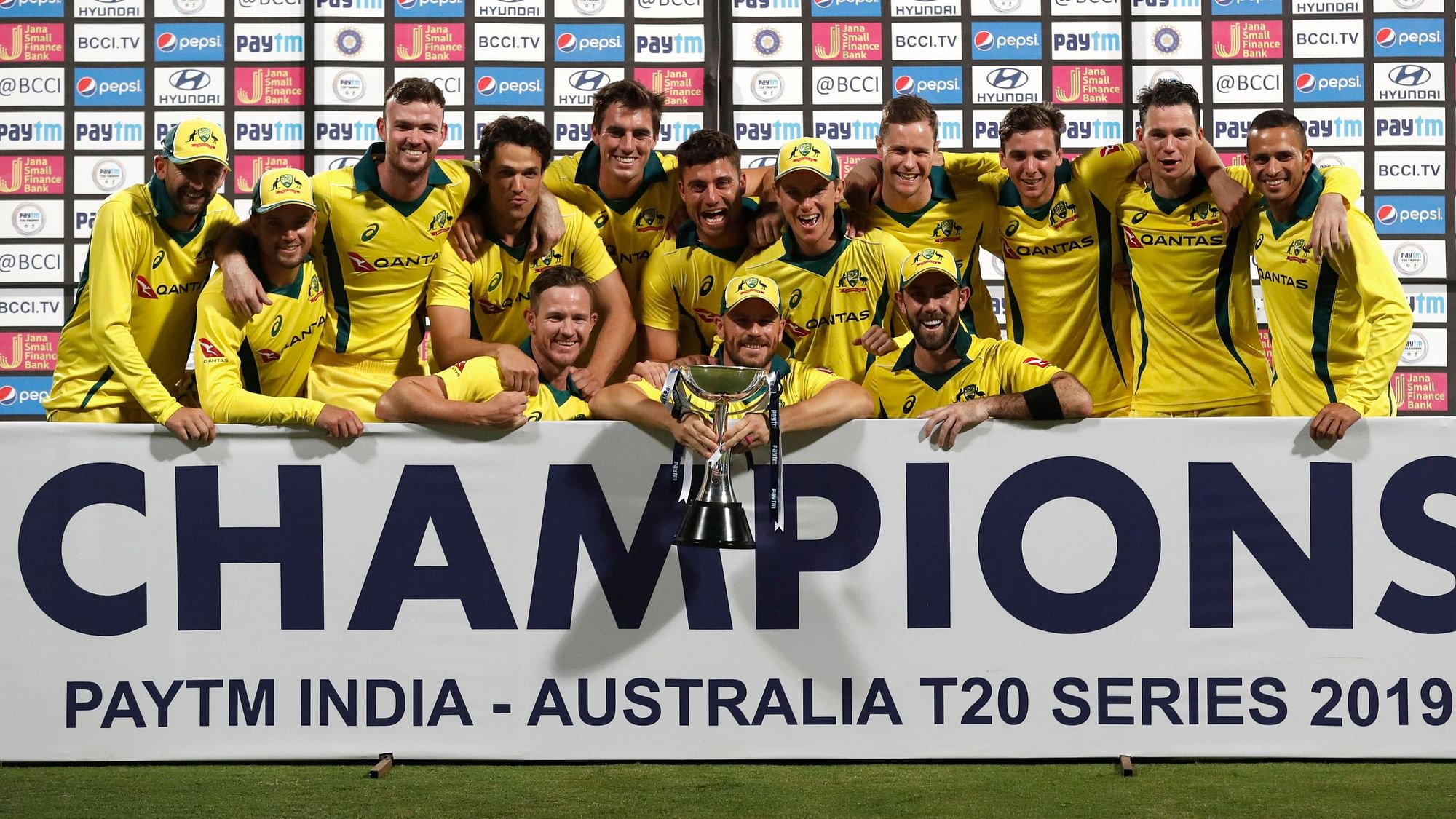 Members of Australian team pose with the winners trophy after their win in the second T20 international cricket match against India in Bangalore, India, Wednesday, Feb. 27, 2019.&nbsp;