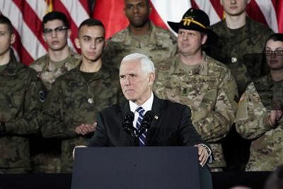 WARSAW, Feb. 13, 2019 (Xinhua) -- U.S. Vice President Mike Pence (Front) speaks to the troops at a military base in Warsaw, Poland, on Feb. 13, 2019. Pence