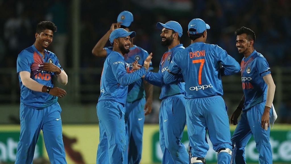 Indian players celebrate after the run-out of D’Arcy Short during the first T20I against Australia at Visakhapatnam.