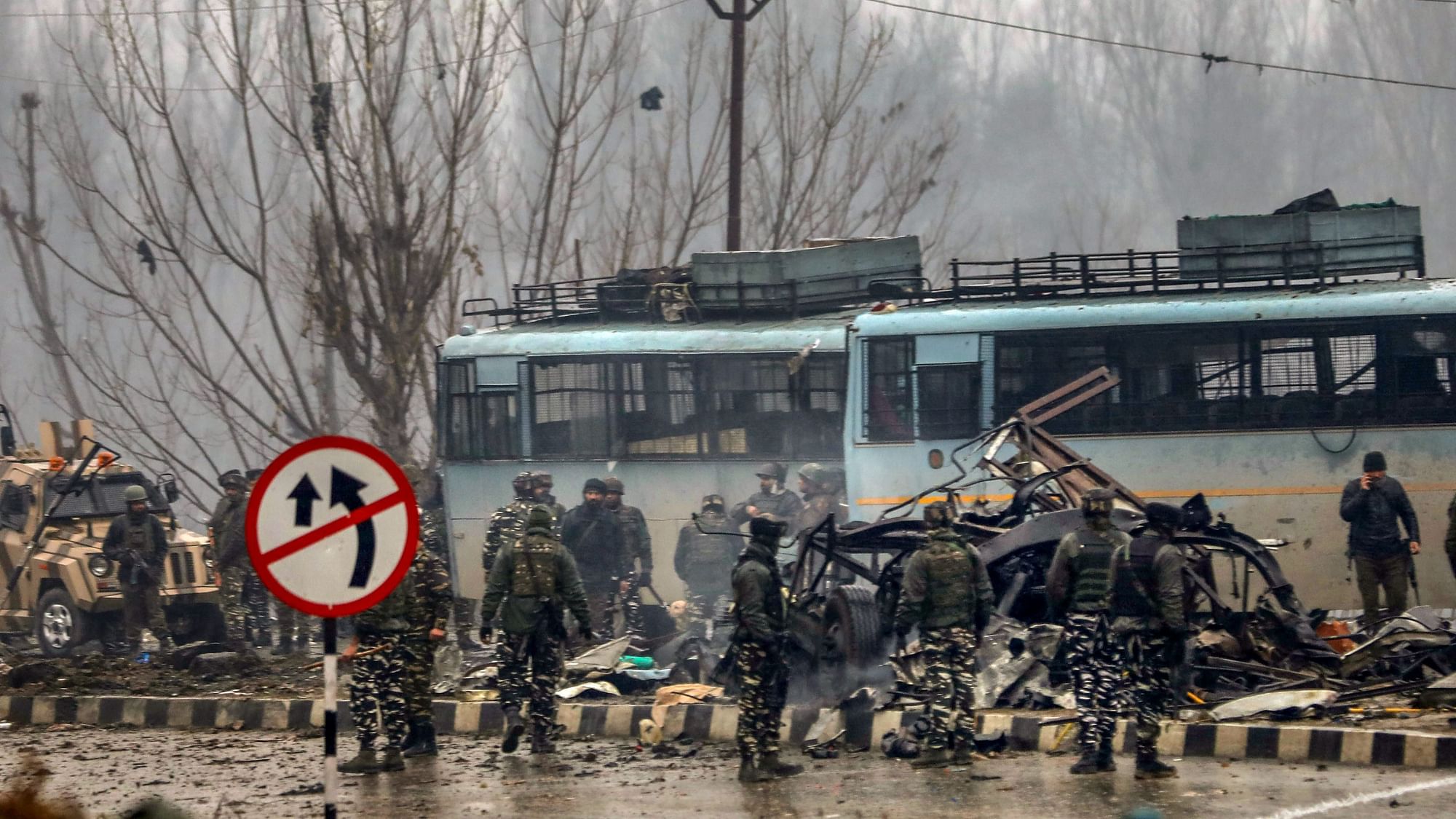 Security personnel carry out rescue and relief work at the site of the suicide bomb attack in Pulwama district of J&amp;K on 14 February.&nbsp;