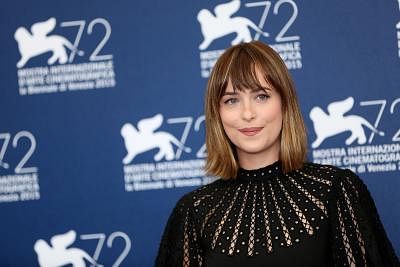 VENICE, Sept. 4, 2015(Xinhua) -- Actress Dakota Johnson attends the photocall of the movie "Black Mass" during the 72nd Venice Film Festival in Venice, Italy, on Sept. 4, 2015. (Xinhua/Jin Yu/IANS)(azp)