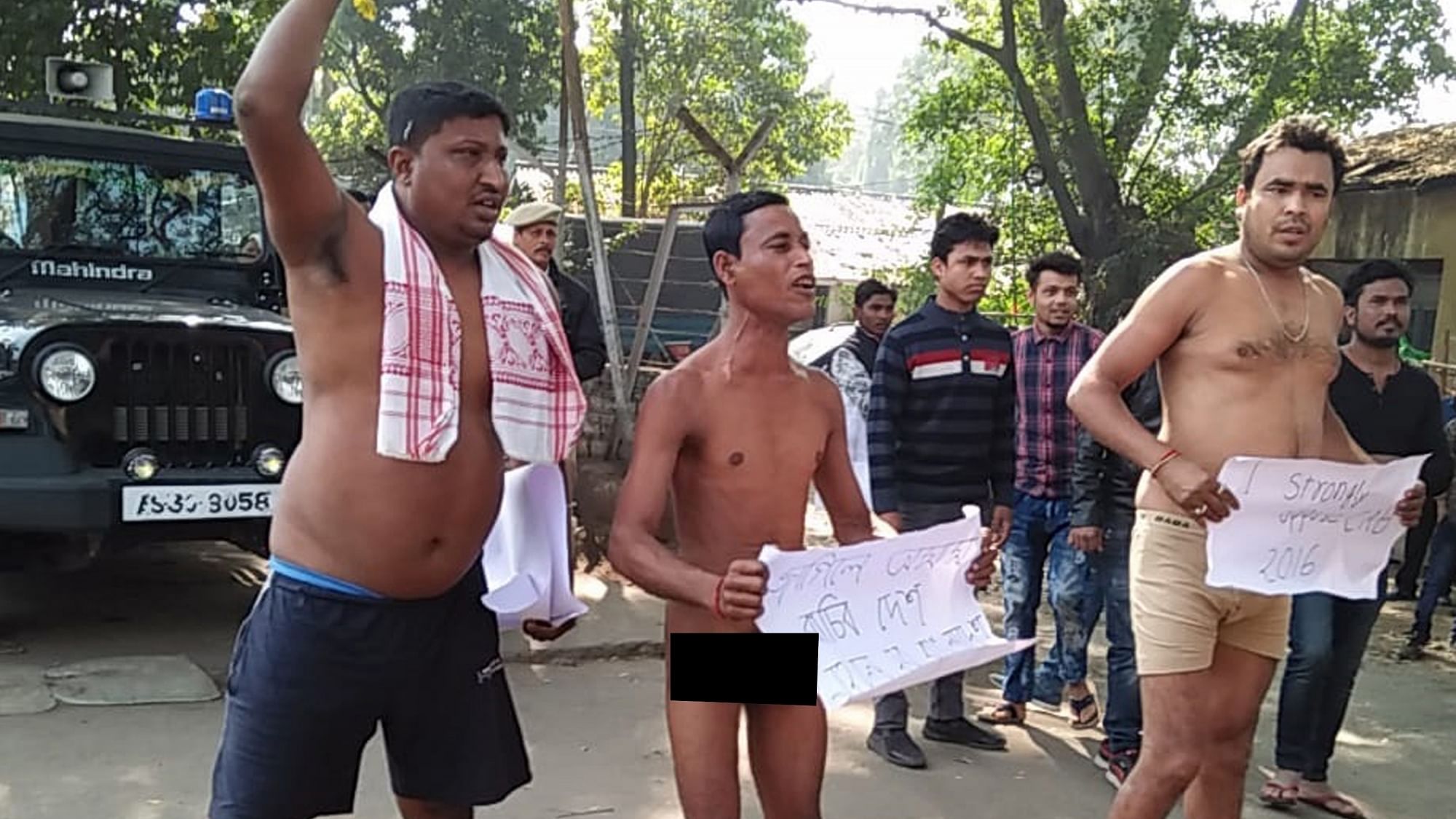 Three men stage a nude protest near the Assam Secretariat against the Citizenship (Amendment) Bill, in Guwahati on 1 February.