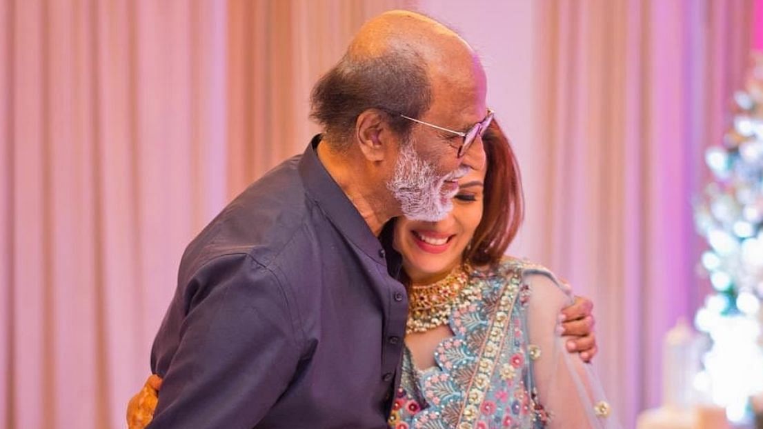 Rajinikanth shares a lovely moment with his daughter Soundarya.