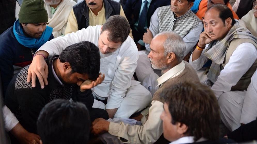 Rahul Gandhi consoles family members of slain jawans.