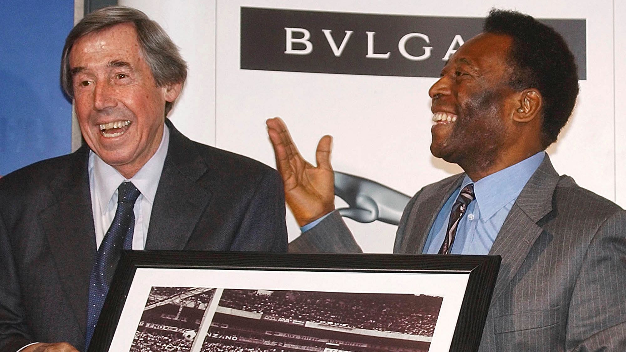 File photo of Brazilian soccer legend Pele (right) presenting former England goalkeeper Gordon Banks with a photograph showing Banks saving a header from Pele in the 1970 World Cup.