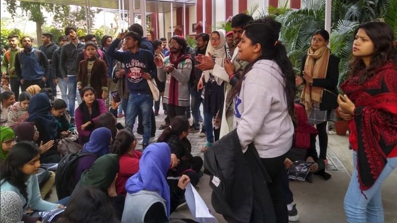 Jamia Millia Islamia students protest against a professor.&nbsp;