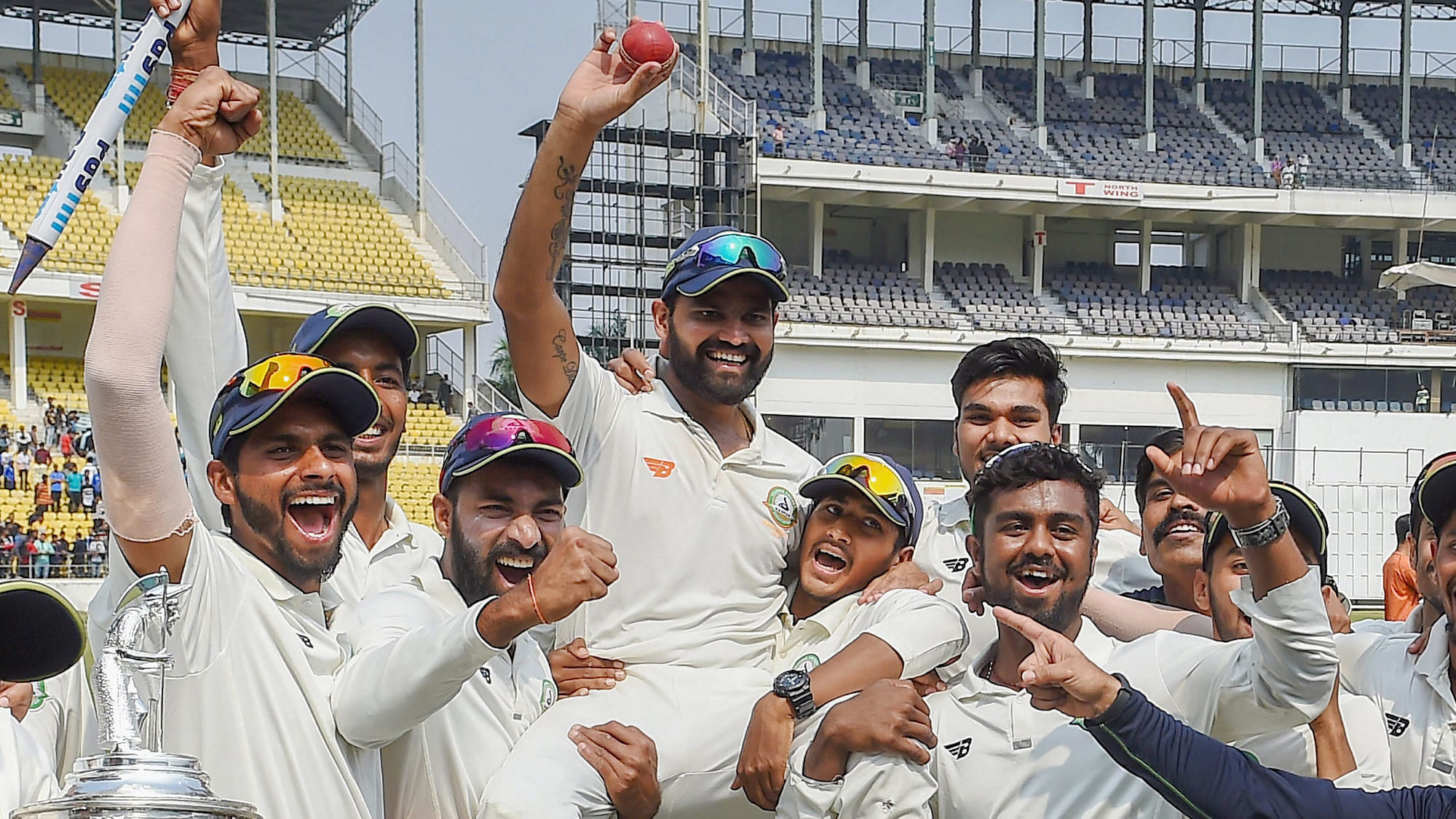 Vidharba players lift man of the match Aditya Sarwate after winning the Ranji Trophy final 2018-19 by defeating Saurashtra, in Nagpur.