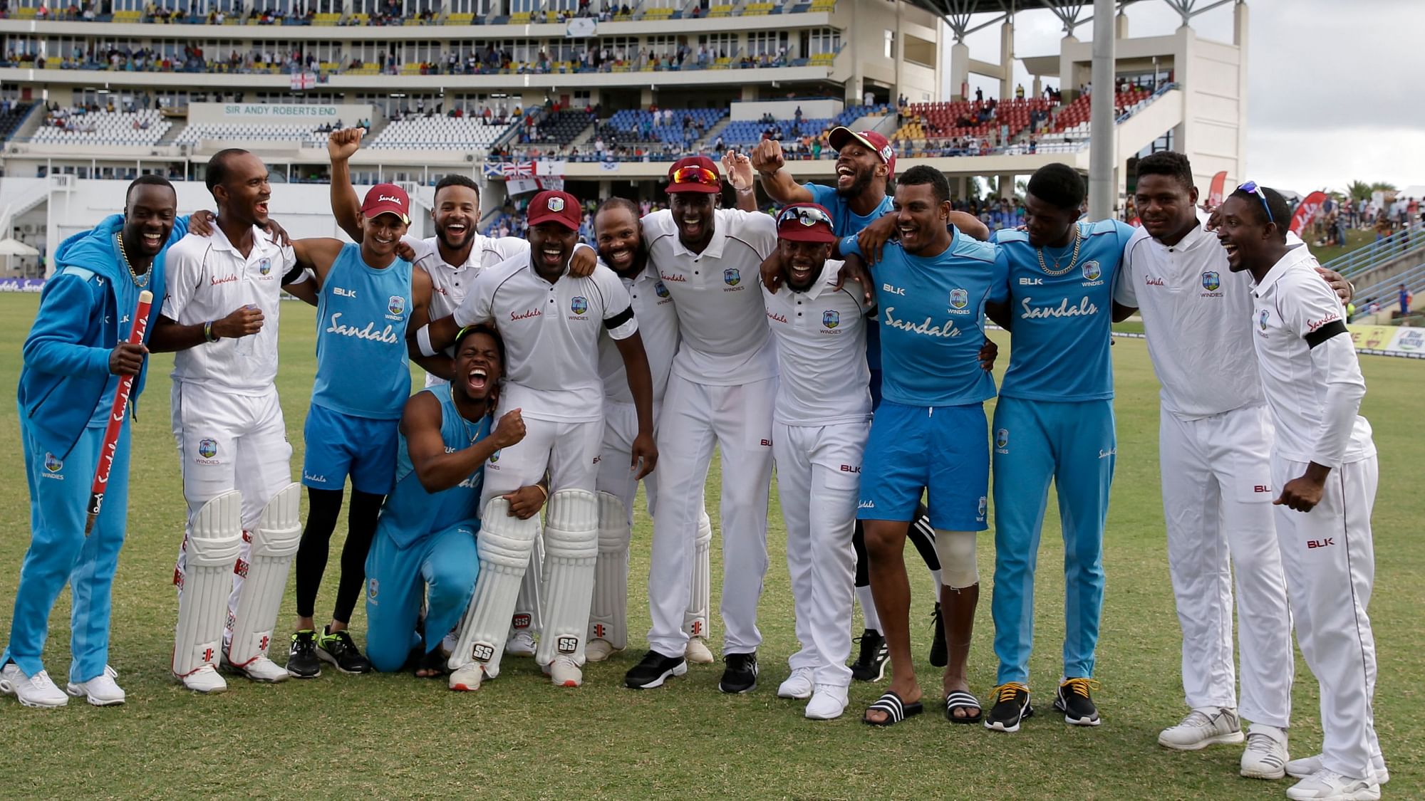 West Indies players celebrate beating England by ten wickets on day three of the second Test cricket match at the Sir Vivian Richards Stadium in North Sound, Antigua and Barbuda, Saturday, Feb. 2, 2019.&nbsp;