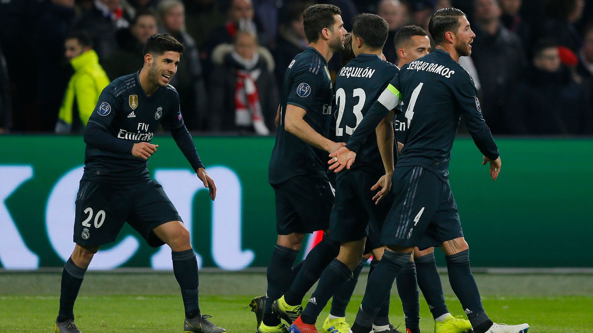 Real midfielder Marco Asensio (left) celebrates after scoring his side’s second goal during the first leg, round of sixteen, Champions League match against Ajax at the Johan Cruyff Arena in Amsterdam, Netherlands on Wednesday Feb. 13, 2019.