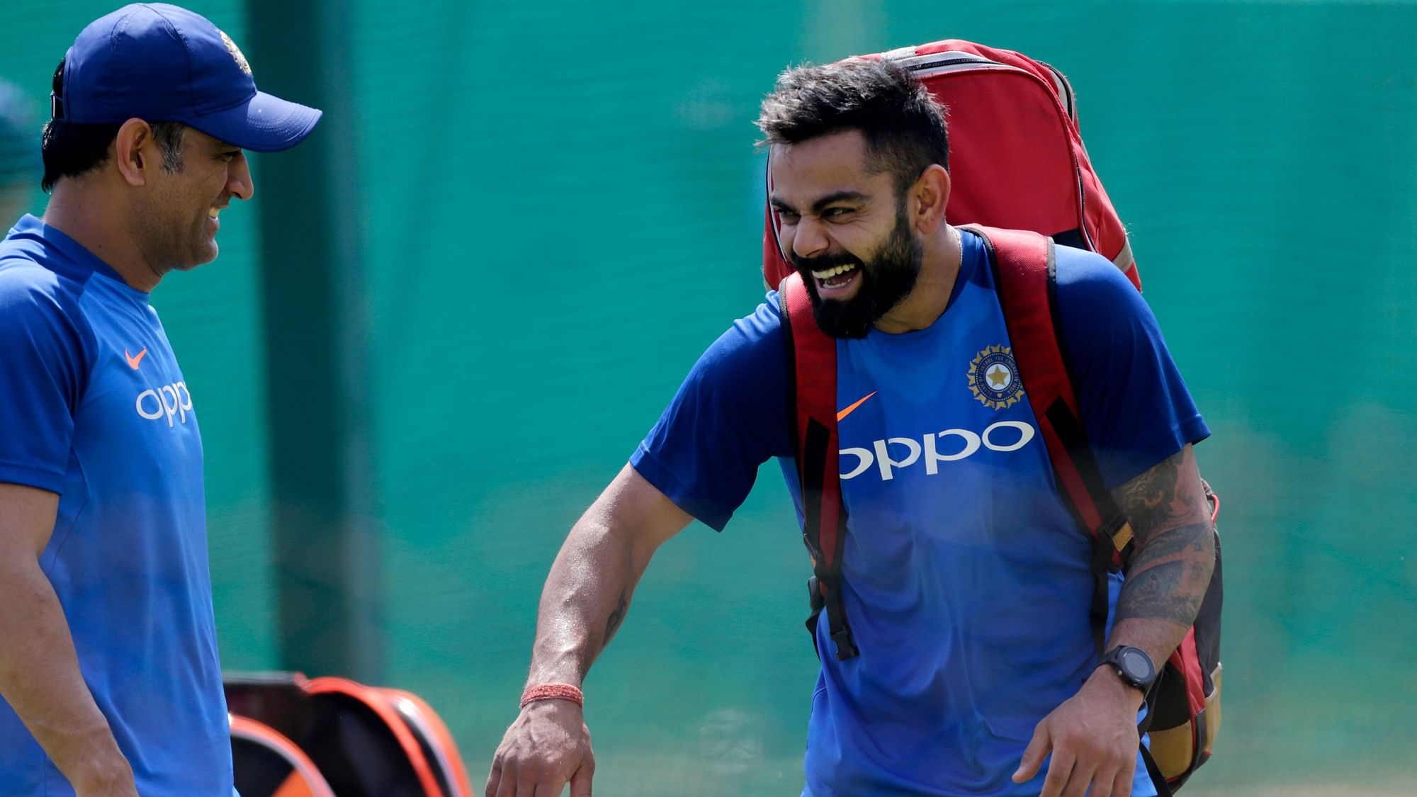 MS Dhoni and Virat Kohli share a laugh in the nets ahead of India’s second ODI against Australia at Nagpur.