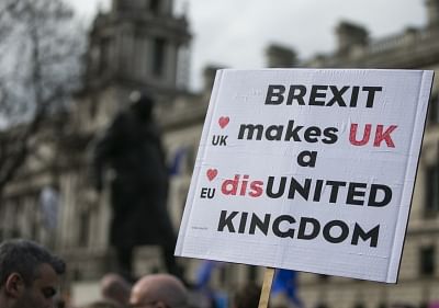 LONDON, March 23, 2019 (Xinhua) -- A placard is seen during the "Put it to the People" march in central London, Britain, on March 23, 2019. Hundreds of thousands of people on Saturday marched through central London calling for another referendum on Brexit as the country is caught by the Brexit impasse again. (Xinhua/Han Yan/IANS)