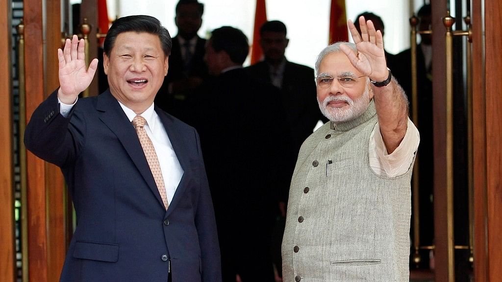 Chinese President Xi Jinping (left) and Indian Prime Minister Narendra Modi (right).&nbsp;