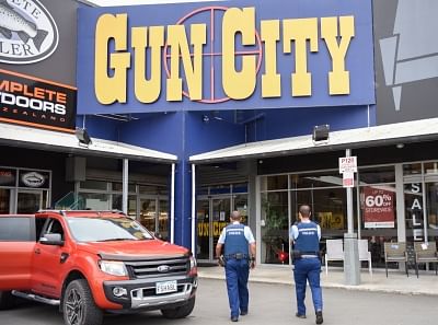 CHRISTCHURCH, March 22, 2019 (Xinhua) -- Police officers patrol near a gun market named "Gun City" at suburb area of Christchurch, New Zealand, March 18, 2019. Military style semi-automatic weapons (MSSA) and assault rifles are to be banned in New Zealand, Prime Minister Jacinda Ardern announced on Thursday.New Zealand government has also moved to ban a number of accessories which can take lower capacity semi-automatic fire arms to weapons of greater killing might. (Xinhua/Guo Lei/IANS)